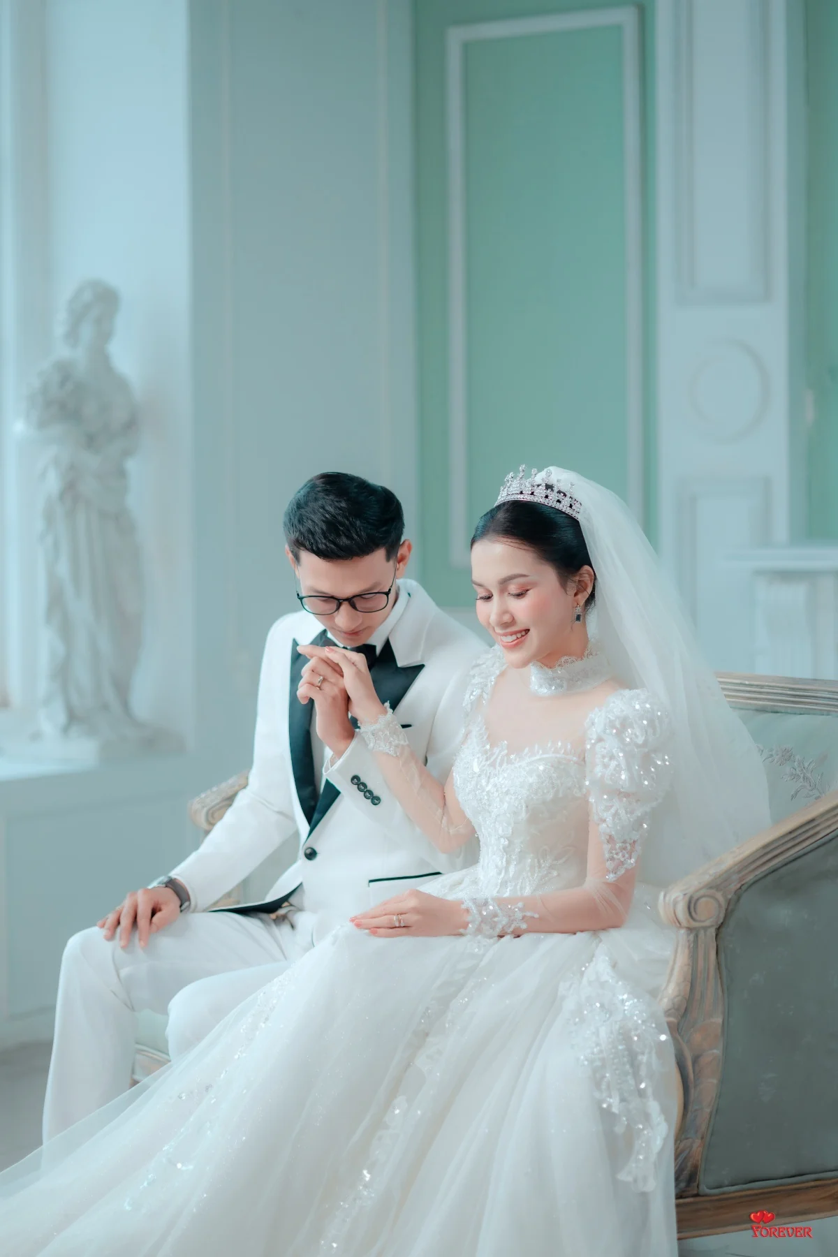 Aung and Hnin, seated together